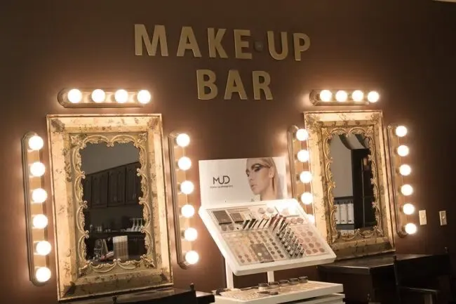 A student practicing styling work at her station